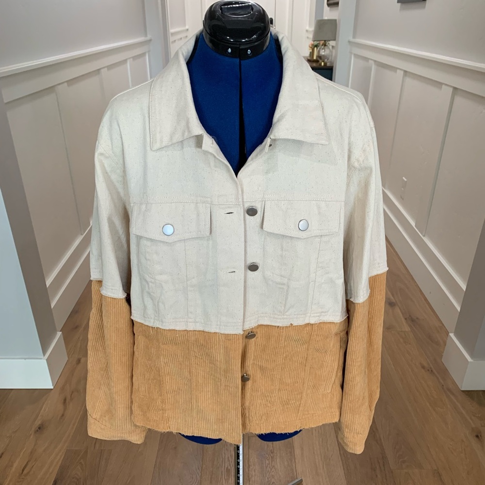 Bohme corduroy color-blocked jacket with slightly frayed bottom hem.